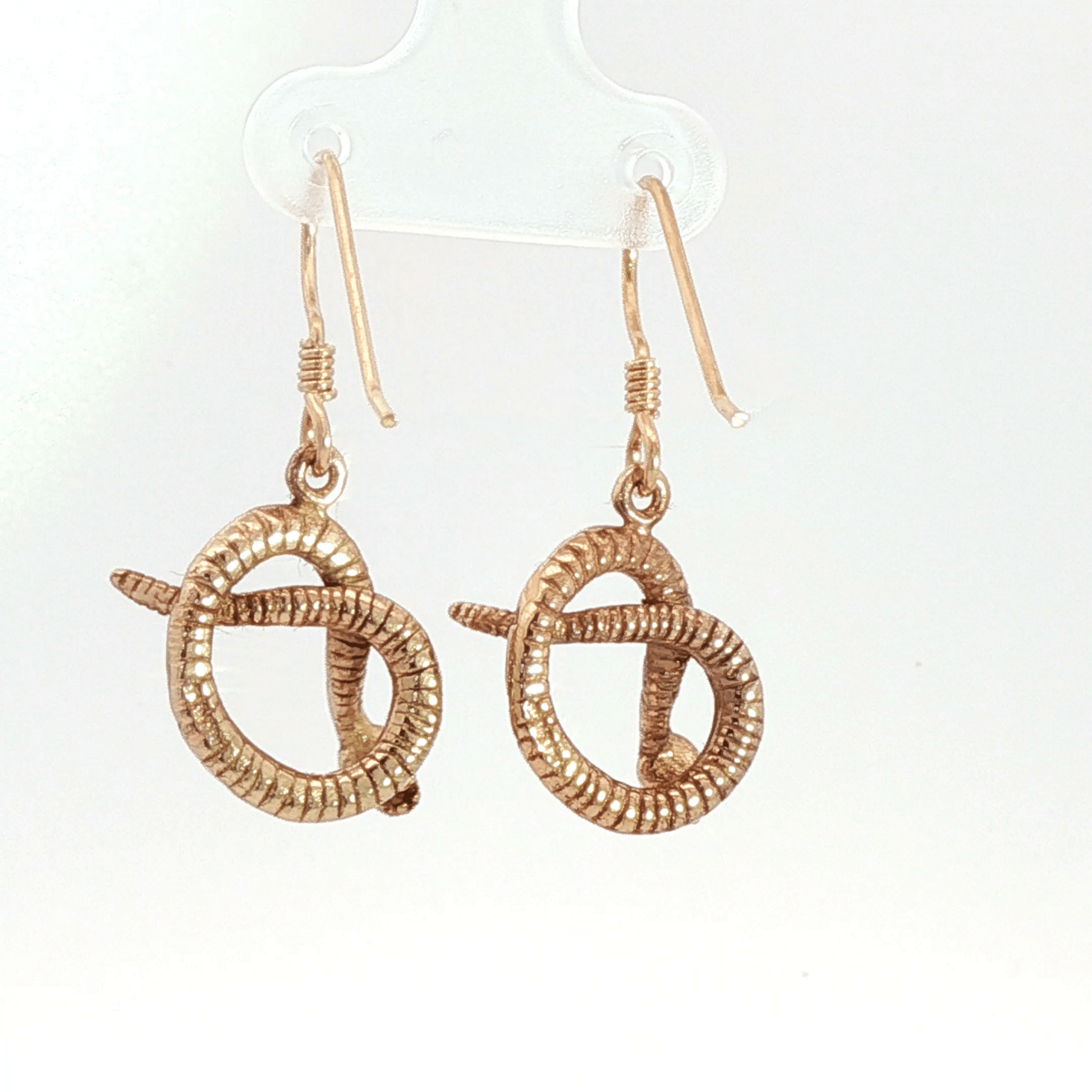 Antique bronze rattlesnake charm earrings, western gothic snake jewelry, small coiled serpent dangle earrings, desert inspired animal jewelry, edgy minimalist reptile earrings for everyday wear by Le Dragon Argenté