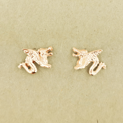 Made-to-order small dragon stud earrings in 10k, 14k, or 18k yellow, pink, or white solid gold by Le Dragon Argenté