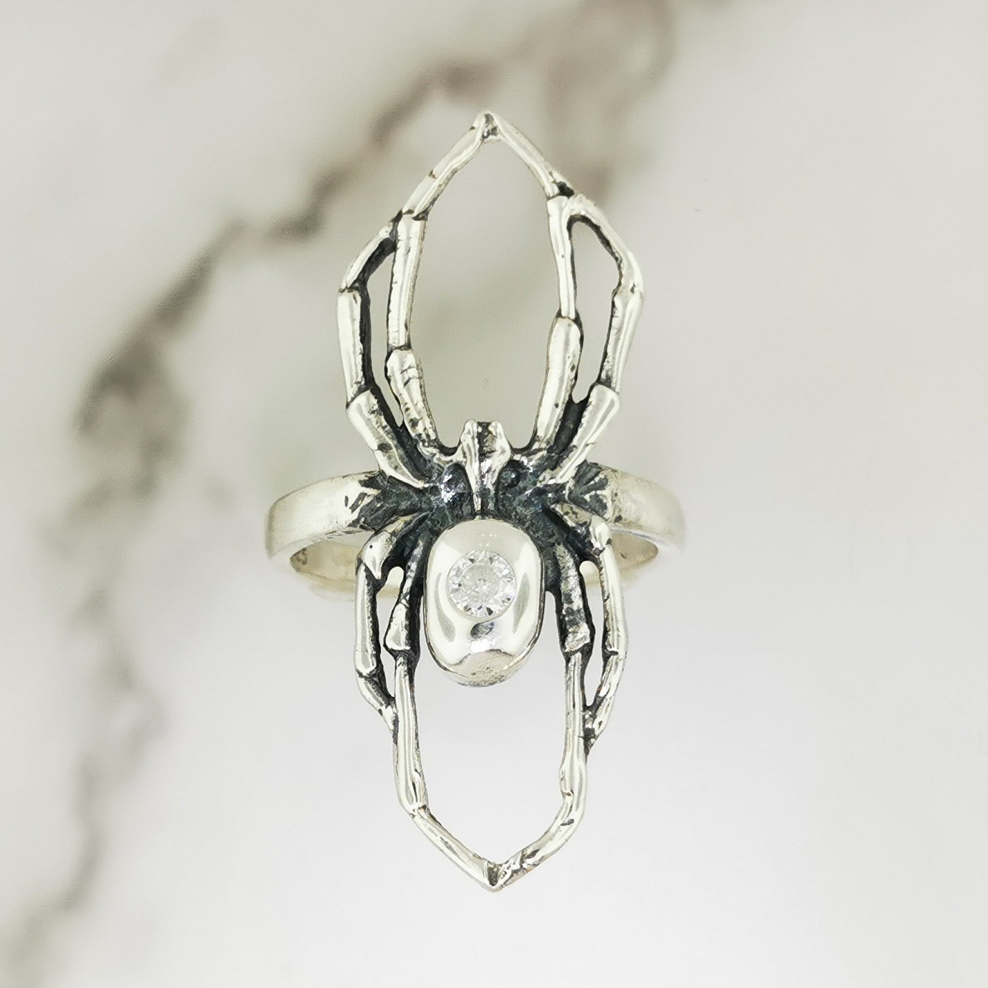 Handcrafted sterling silver spider ring with April birthstone CZ gothic 3D design perfect for fans of gothic fashion Halloween or witchy jewelry.- Le Dragon Argenté