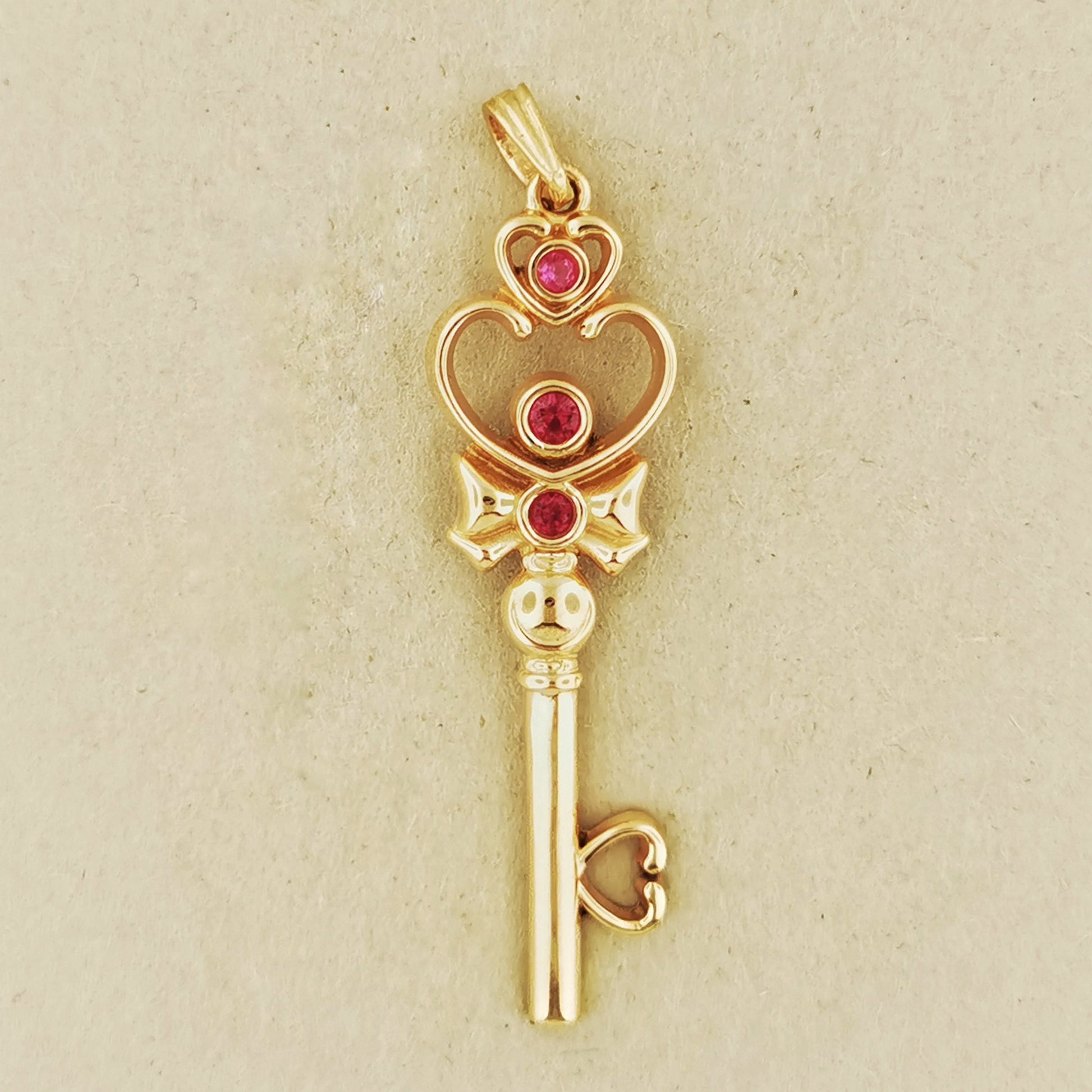 Time Key Pendant in Antique Bronze with July birthstone, Magical Girl Anime Pendant, Bronze Key Pendant, Space Time Key Pendant, Space Time Key, Anime Bronze Pendant, Anime Gemstone Pendant, Bronze Key Pendant, Gamer Girl Jewelry, Gamer Girl Pendant