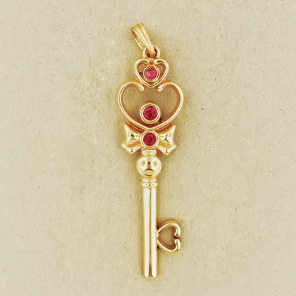 Time Key Pendant in Antique Bronze with July birthstone, Magical Girl Anime Pendant, Bronze Key Pendant, Space Time Key Pendant, Space Time Key, Anime Bronze Pendant, Anime Gemstone Pendant, Bronze Key Pendant, Gamer Girl Jewelry, Gamer Girl Pendant