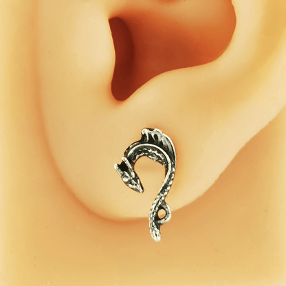 Tiny dragon stud earrings in sterling silver by Le Dragon Argenté – detailed miniature dragon jewellery perfect for subtle fantasy flair and everyday wear.