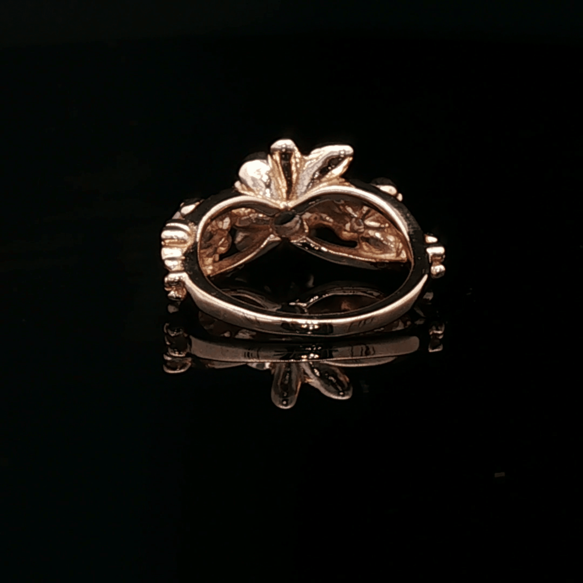Triple rose birthstone ring in antique bronze with colourful birthstones and ornate floral detailing in gothic vintage style by Le Dragon Argenté