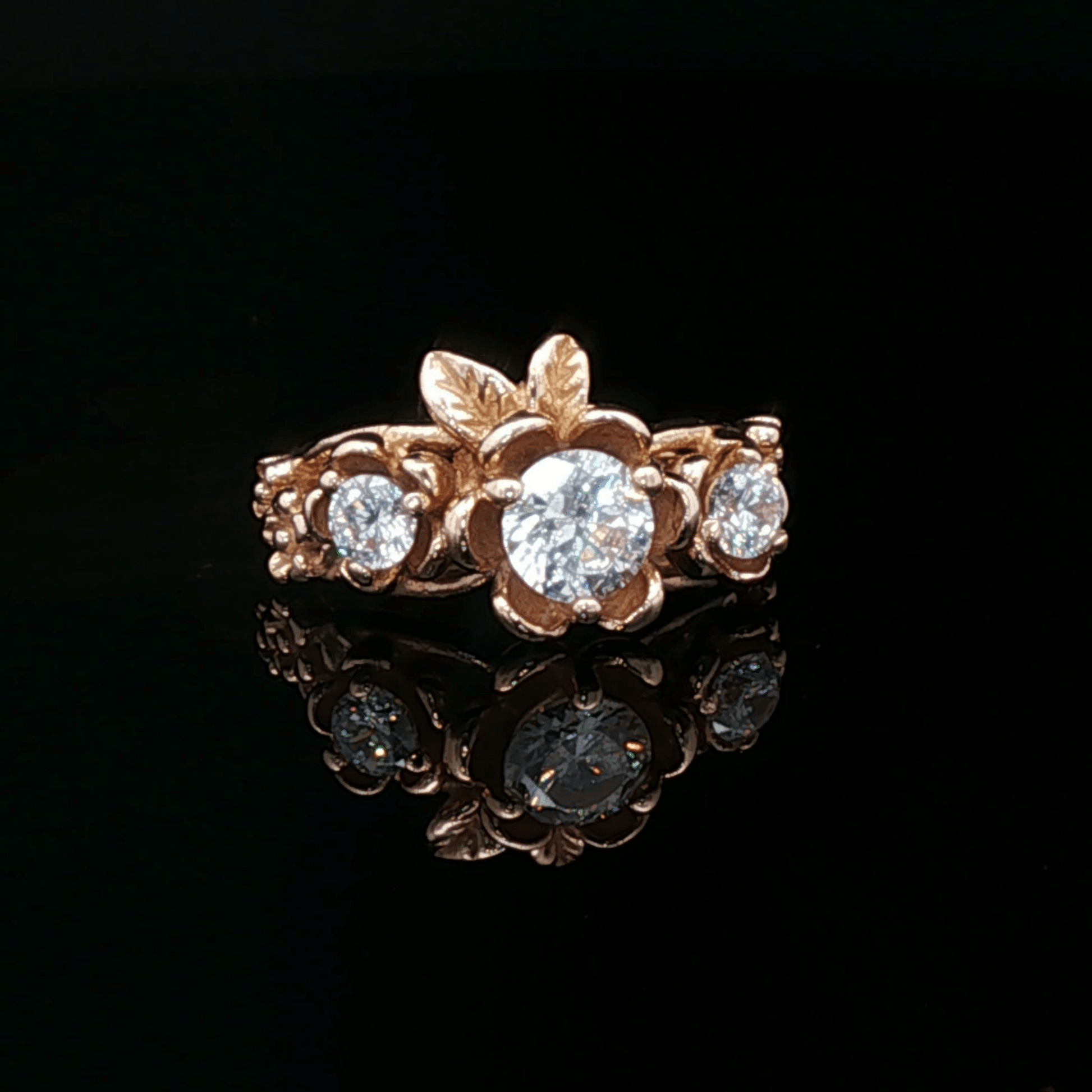Triple rose birthstone ring in antique bronze with colourful birthstones and ornate floral detailing in gothic vintage style by Le Dragon Argenté