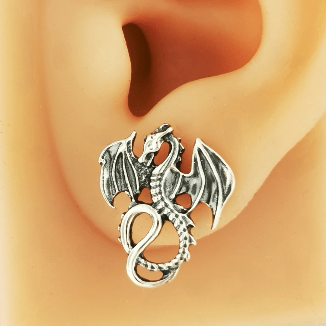Winged dragon stud earrings in solid sterling silver from Le Dragon Argenté – dragon jewellery for fantasy fans and bold style lovers.