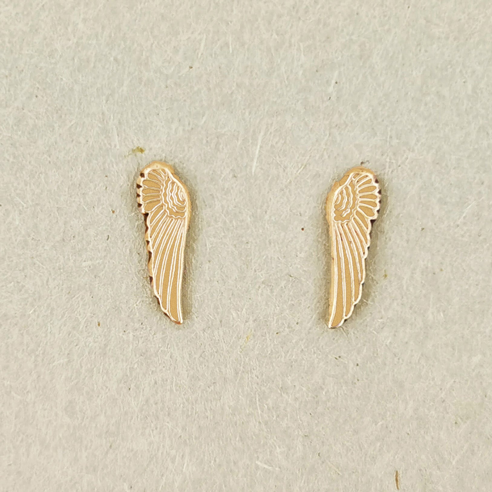 wings stud earrings in gold, gold wing earrings, gold stud earrings, gold wings earrings, small gold earrings, small gold stud earrings, wing studs in gold, wing earrings in gold, gold second hole earrings, gold wing jewelry, angel wing earrings, gold angel wing earrings, angel wing jewelry, angel wing jewellery