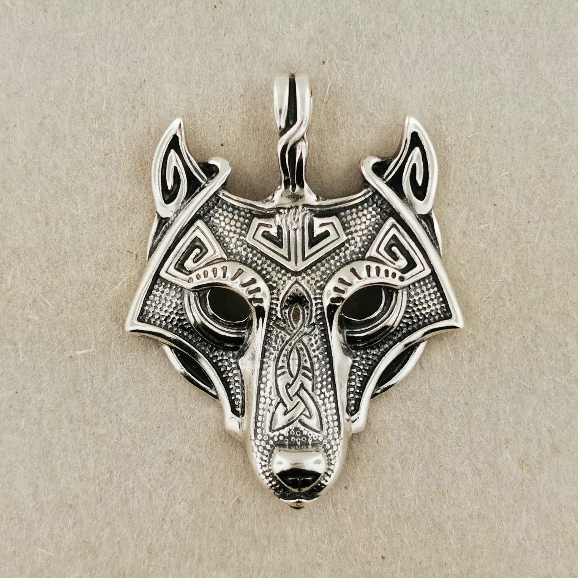 tribal wolf pendant in sterling silver front